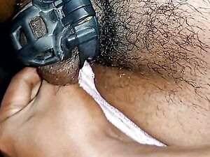 Hairy femboy piss walking in chastity cage