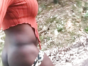 Black shemale showing her sexy goods outdoors