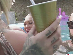 Shemales having group sex by the pool